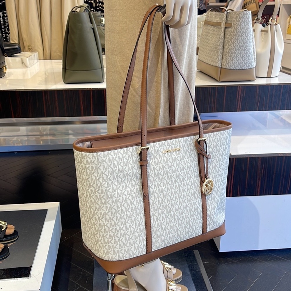 MICHAEL KORS
Jet Set Travel Large Logo Tote Shoulder Bag
COLOR VANILLA 
NWT - Picture 10 of 16